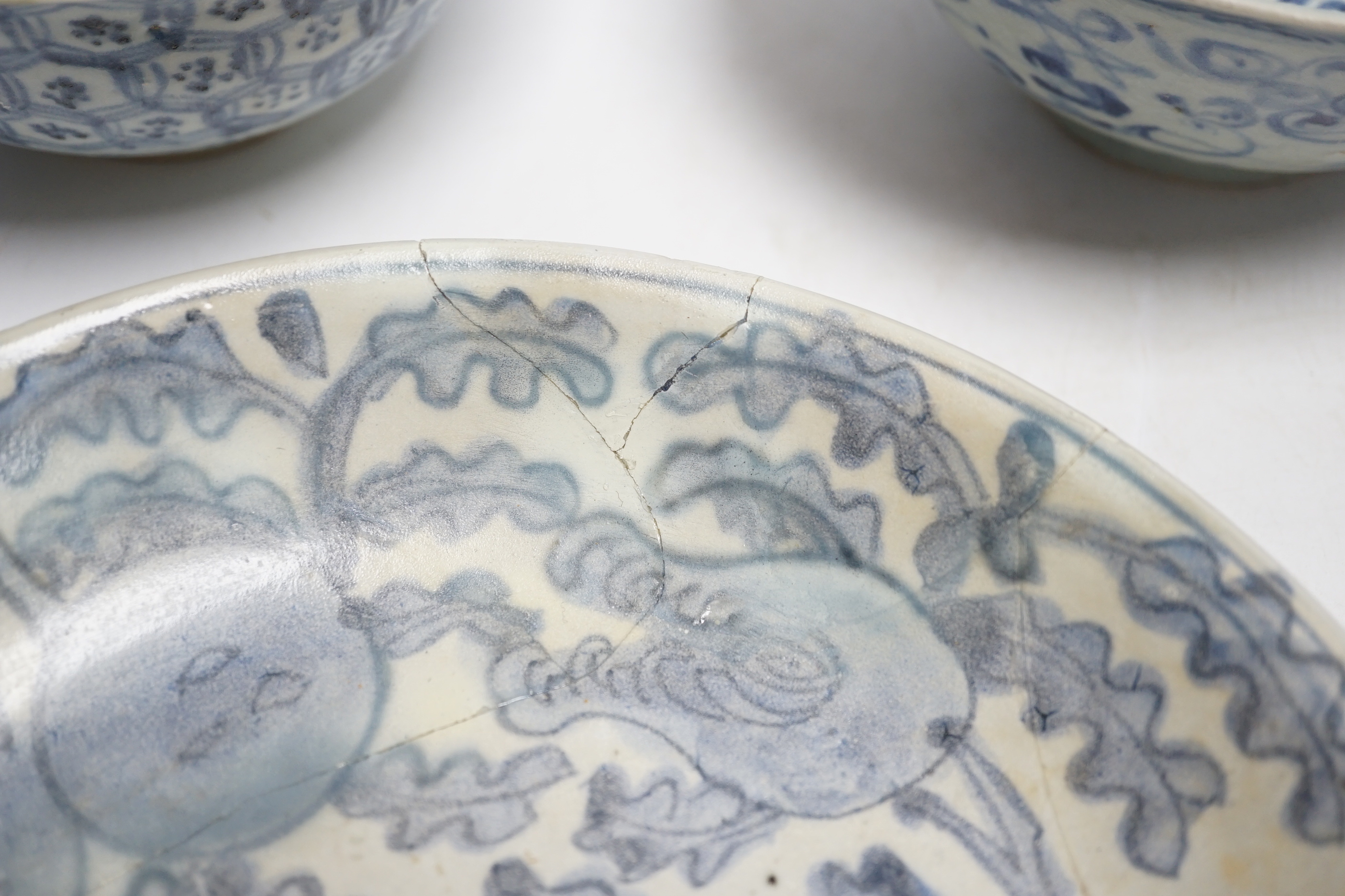 Chinese Ming dynasty shipwreck ceramics - three blue and white pottery bowls and three dishes, largest 25cm diameter